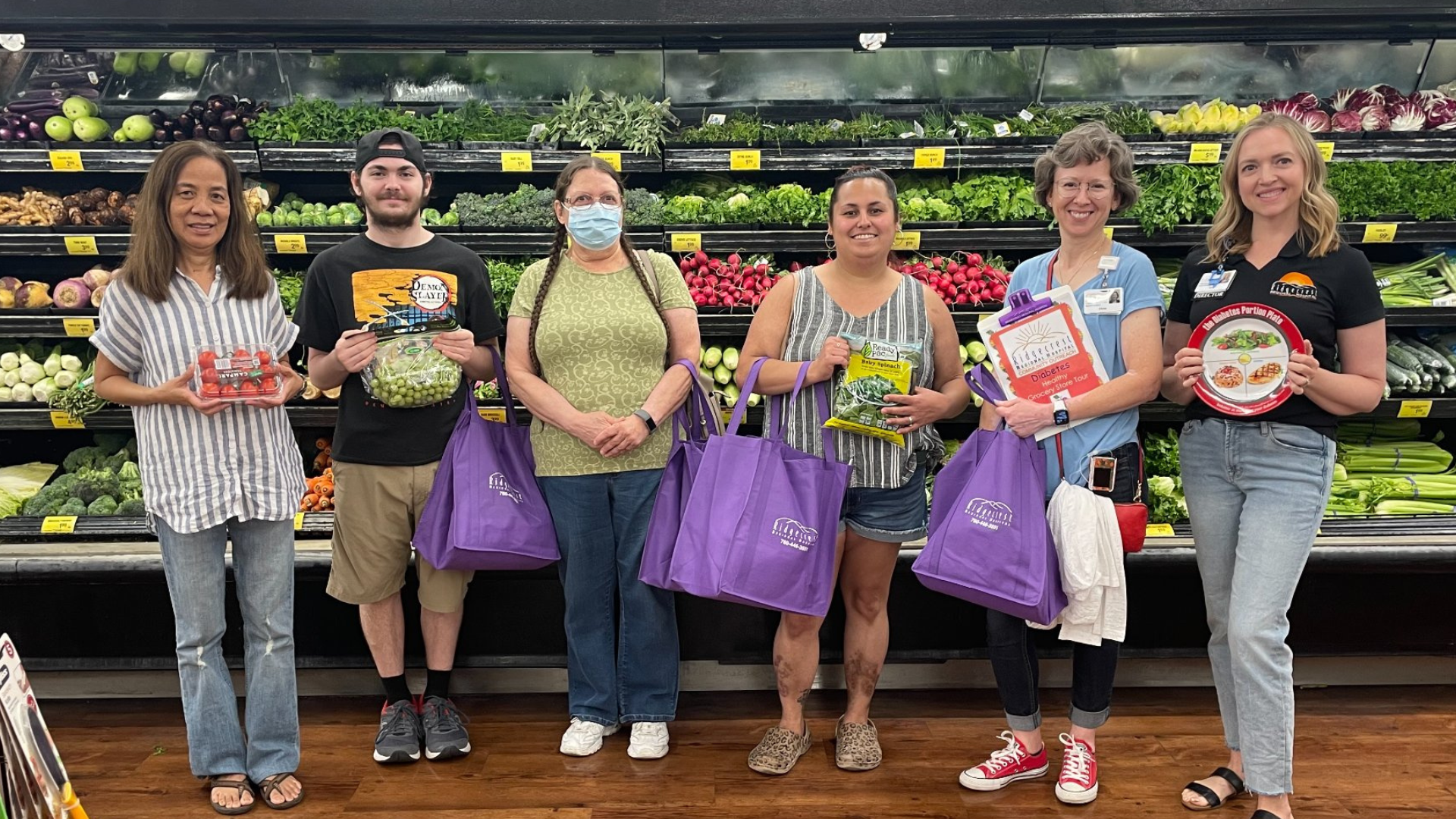 People in Produce Section of Grocery Store